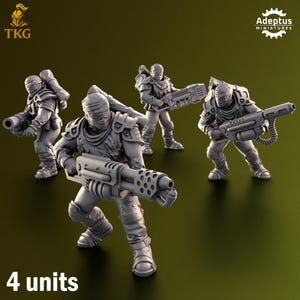 May include: Four gray miniature figures of soldiers in combat gear, each holding a large weapon. The figures are in various action poses, with the text "4 units" at the bottom. The logos "TKG" and "Adeptus Miniatures" are visible.