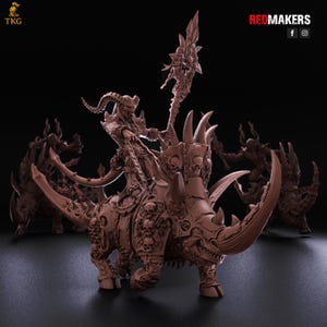 May include: A brown fantasy miniature of a horned rider on a rhino-like creature, adorned with skulls and spikes. The rider holds a staff with a skull-shaped top. The image includes the text "REDMAKERS" and the logo "TKG".