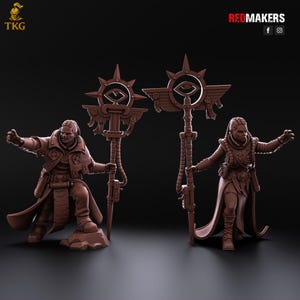 May include: Two brown miniature figures, a man and a woman, each holding a staff with an eye-shaped emblem. The figures are dressed in detailed, futuristic attire. The Redmakers logo is visible in the top right corner.