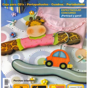 May include: Magazine cover titled "Pintura Country" with a giraffe-shaped hanger and an orange car-shaped hanger. The cover includes text in Spanish, advertising CD cases, handkerchief holders, pictures, and bottle holders. The magazine also features the text "Perchas infantiles".