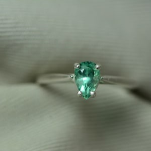 Emerald Ring, Pear Cut Colombian Emerald 0.63 Carats Appraised 756.00 Sterling Silver Solitaire Ring