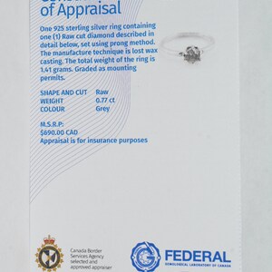 May include: A white appraisal report for a sterling silver ring with a raw cut diamond. The report includes details about the ring, such as the shape, weight, color, and price. The report is from the Federal Gemological Laboratory of Canada.