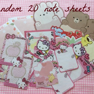 May include: A set of 20 pink and white Hello Kitty themed note sheets. The sheets feature various Hello Kitty characters, including a bear, a bunny, and a bee. The sheets are decorated with hearts, stars, and other cute designs. The text "Hello Kitty" and "Winnie the Pooh" are visible on the sheets.