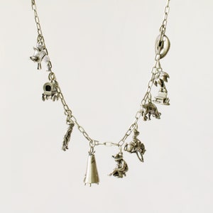 Vintage cowboy silver charm bracelet, southwest, nine charms, western, cowgirl, old west, saddle, horse, bull, stetson hat, rodeo, gold rush