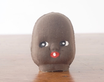 Vintage face pressed cloth mask for black doll head, molded fabric, painted, African American, brown and red, 1930s or 1940s children's toy