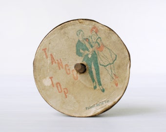 Antique Tango Top, jouet en métal de filature avec danseurs de tango des années 1910, Patent Novelty Company, Fulton, Illinois, monocle, crachats