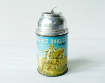 Vintage Annie Oakley and Tagg thermos lunchbox bottle, 1955 Aladdin 8 oz tin litho glass vacuum bottle, snap-tite stopper, western cowgirl