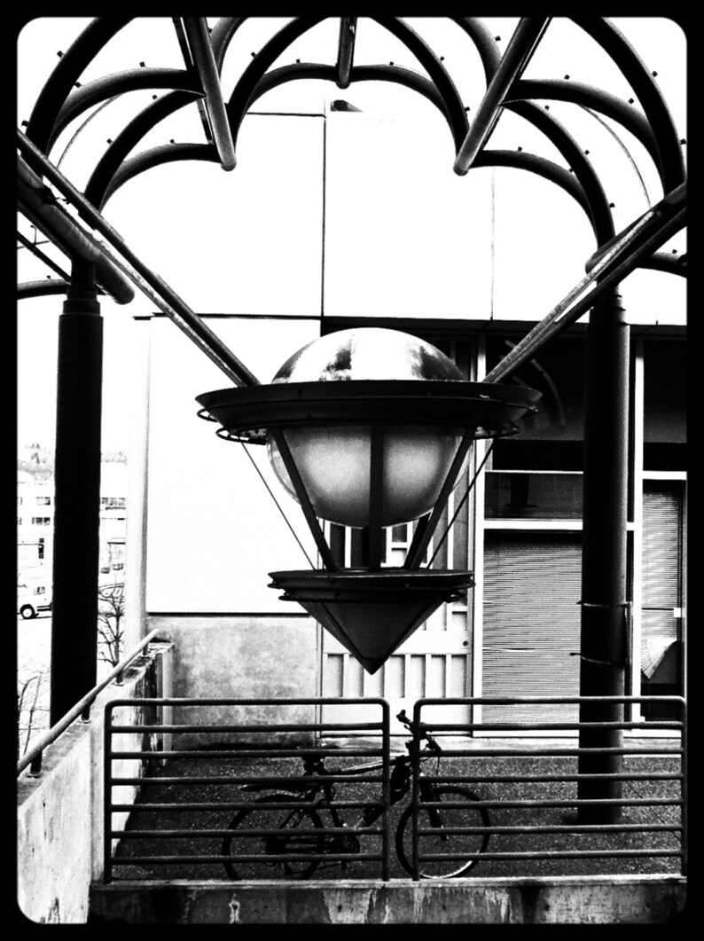 Photo of Art Deco Style Sculpture over Bus Stop  & Stairs Parked Bicycle Downtown Tacoma Washington Black and White by Shelley McElhiney