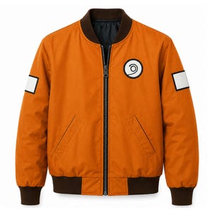 May include: An orange bomber jacket with a dark brown ribbed collar, cuffs, and hem. The jacket features a central zipper, two slanted front pockets, and a circular white patch with a black spiral design on the left chest. White rectangular patches are on each sleeve.