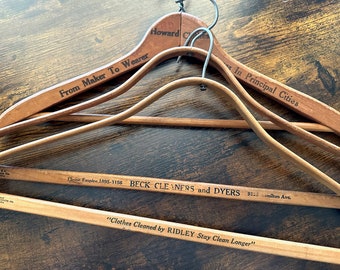 Set of 3 vintage wooden clothes hangers, printed advertisements, great vintage shabby chic look