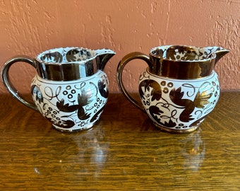 Pair of 1940s-1950s lusterware Wedgwood pitchers, copper silver, made in England