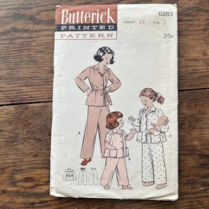 May include: Vintage sewing pattern for pajamas, featuring three figures in pajamas. The pattern is from Butterick, number 6283, size 6, bust 24, and costs 35 cents.