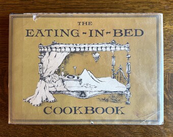 The Eating-in-Bed Cookbook, third printing 1962 by Barbara Byfield, Macmillan, dust jacket plus plastic cover