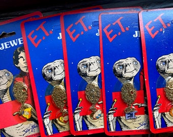 1980s 1982 NOS deadstock E.T. the Extra Terrestrial enamel necklaces, Star Power, E.T. Elliot on card, original packaging, movie memorabilia