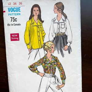 May include: Vintage Vogue sewing pattern number 7583 for a blouse with a collar and long sleeves. The pattern includes three different views of the blouse, one in yellow, one in white, and one in a floral print. The pattern is for sizes 12, 34, and 36.