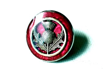 Scottish thistle lapel pin with pink background