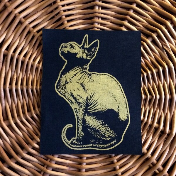 Bastet. Hairless Cat handmade screenprinted patch, gold on black.