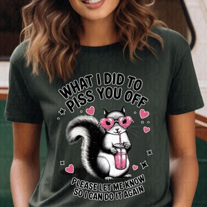 Close-up of sassy squirrel DTF transfer with sage heart sunglasses and bold text, funny attitude design