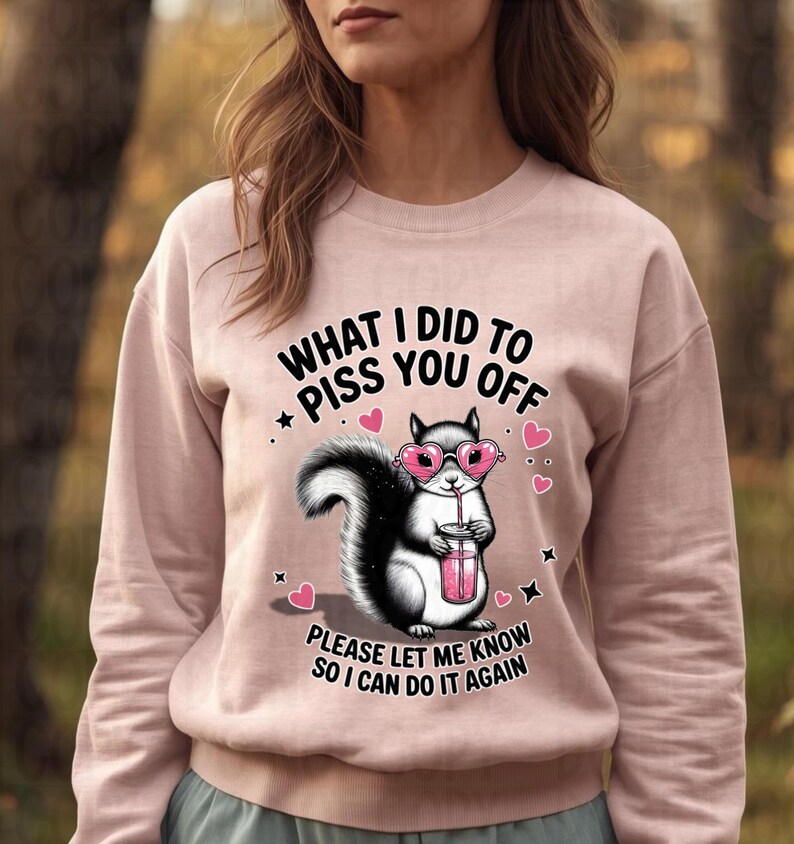 Pink sweatshirt with sassy squirrel attitude design holding pink drink, Galentines funny sweatshirt