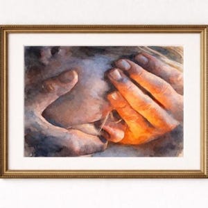 May include: Watercolor painting of hands cradling a face, framed in a gold-colored frame. The artwork features warm tones of orange and brown, with soft, diffused lighting. The hands are the focal point, with detailed brushstrokes.