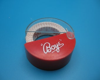 Boye Tape Measure Plastic Coated Fiberglass in Red and Clear Plastic Round Container Made in USA