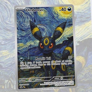 May include: A Pok&eacute;mon trading card featuring Umbreon, a dark-type Pok&eacute;mon. The card has a starry night background, with the text "Umbreon" at the top. The card's design includes the text "Moonlit Veil" and other game-related text.