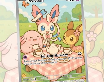 May include: A Pokémon trading card featuring Sylveon and other characters at a tea party. The card has a pink and white checkered tablecloth, a teapot, and teacups. The card's text reads "Tea Time Harmony".