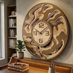 May include: A large, round wooden wall clock with a layered design. The clock face features the numbers 12, 3, 6, and 9. The clock hands are dark brown. The clock is mounted on a light-colored wall. The clock's diameter is approximately 24 inches.