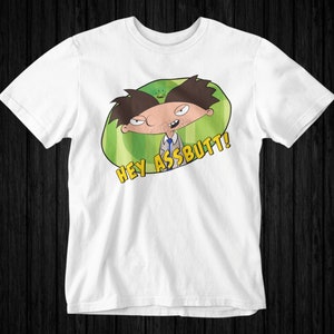 Könnte beinhalten: Weißes T-Shirt mit einer Comicfigur im Anzug und einer grünen Wassermelone mit dem Text "Hey Assbutt!" darauf gedruckt.