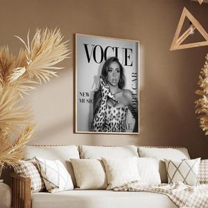 May include: A white ceramic mug with a black handle and the text "But First, Coffee" in a handwritten style. The mug is on a white surface. The mug is 4 inches tall.