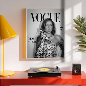 May include: A set of three ceramic mugs with a speckled, matte finish. The mugs are in shades of cream, light gray, and dark gray. Each mug has a simple, minimalist design and a rounded handle.