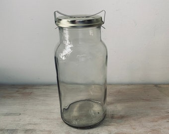 Scarce Early No 65 Glass Fowler's jar complete with lid and clip. Glass storage jar.