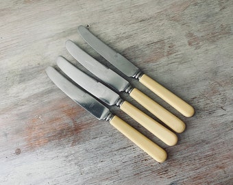 Four VINTAGE, ENGLISH, "Phoenix Imperial", Sheffield, high quality Bone Handle dinner Knives.  My vintage home.