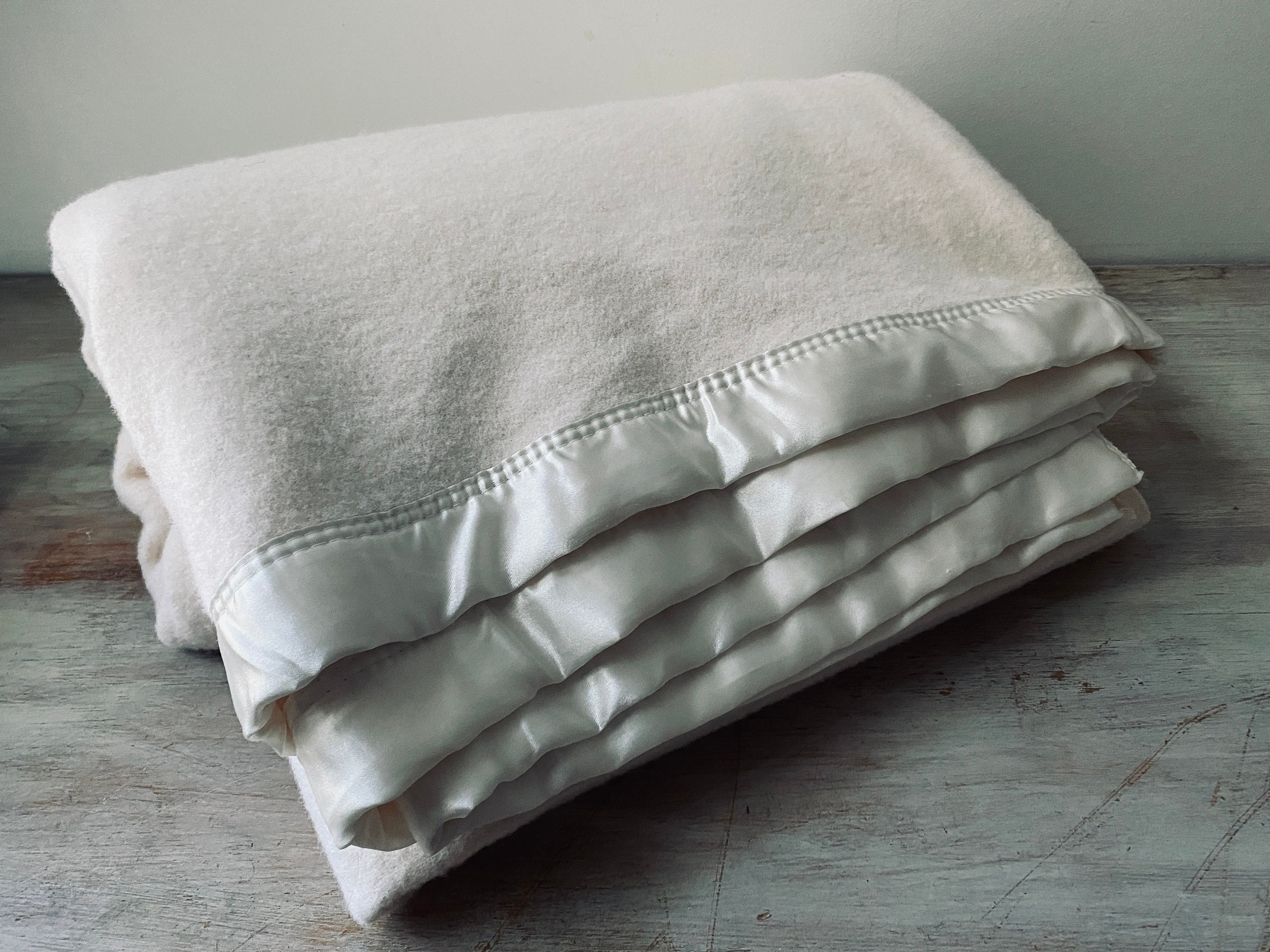 Merino wool blanket with satin trim sale