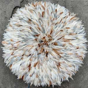 beige juju hat grey wall decor · white brown and grey boho wall hanging feather