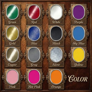 May include: A wooden display board featuring a collection of color swatches in ornate, bronze-colored frames. Each frame contains a different color, such as green, red, white, purple, gold, blue, black, sky blue, copper, gray, silver, yellow, pink, hot pink, and orange. The word "COLOR" is displayed in a decorative font.