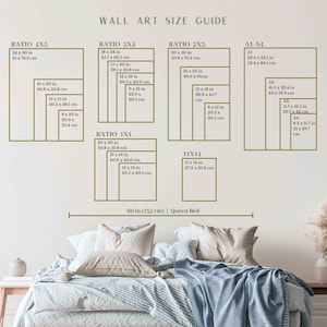 May include: A wall art size guide with different ratios and measurements in inches and centimetres. The guide includes ratios like 4x5, 3x4, 2x3, 1x1, and 11x14. The guide also includes standard paper sizes like A1, A2, A3, and A4. The guide is displayed on a wall above a queen-sized bed.