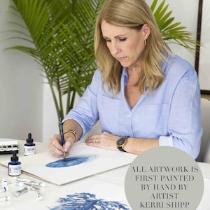 May include: A woman paints a blue watercolour illustration of a sea plant. The text "ALL ARTWORK IS FIRST PAINTED BY HAND BY ARTIST KERRI SHIPP" is visible in the image.
