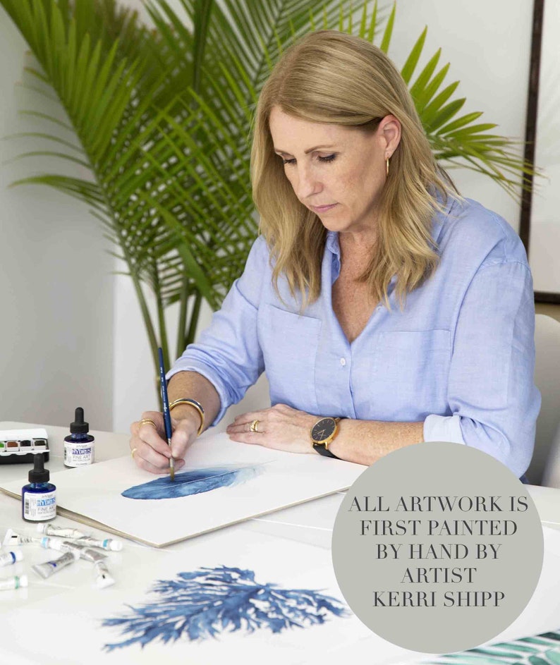 May include: A woman paints a blue watercolour illustration of a sea plant. The text "ALL ARTWORK IS FIRST PAINTED BY HAND BY ARTIST KERRI SHIPP" is visible in the image.