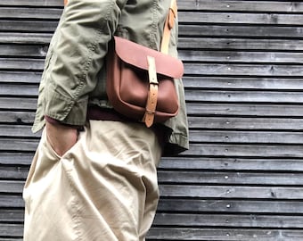 Day bag, satchel made in light brown oiled leather  with adjustable shoulder strap UNISEX