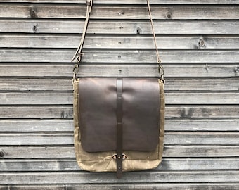Men's messenger bag in waxed canvas with hand waxed leather flap and adjustable shoulder strap