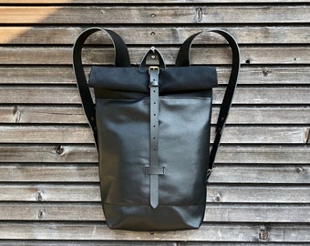 Leather backpack with waxed canvas  roll to close top