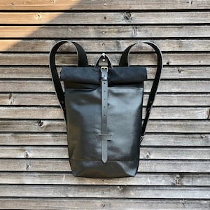 Leather backpack with waxed canvas  roll to close top