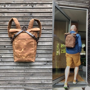 Waterproof backpack medium size rucksack in waxed canvas, with volume front pocket and double layered bottom