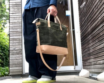 Olive green waxed canvas tote bag / office bag with luggage handle attachment leather handles and shoulder strap