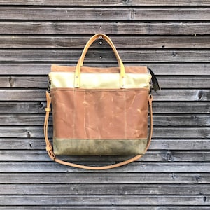 Bolso de mano realizado en lona encerada seca / bolso de oficina con asas de piel y bandolera.