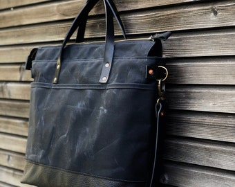 Black waxed canvas tote bag / office bag with luggage handle attachment leather handles and shoulder strap