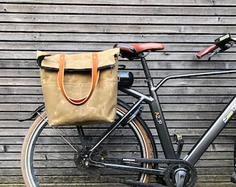 Bike pannier / diaper bag convertible into bicycle bag in waxed canvas with zipper closure and cross body strap