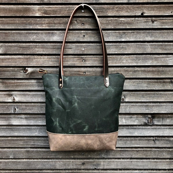 Waxed canvas tote bag  with leather handles and zipper closure