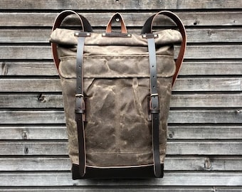 Waxed canvas rucksack/backpack with roll up top and waxed leather shoulderstrap,handle and leather bottem COLLECTION UNISEX